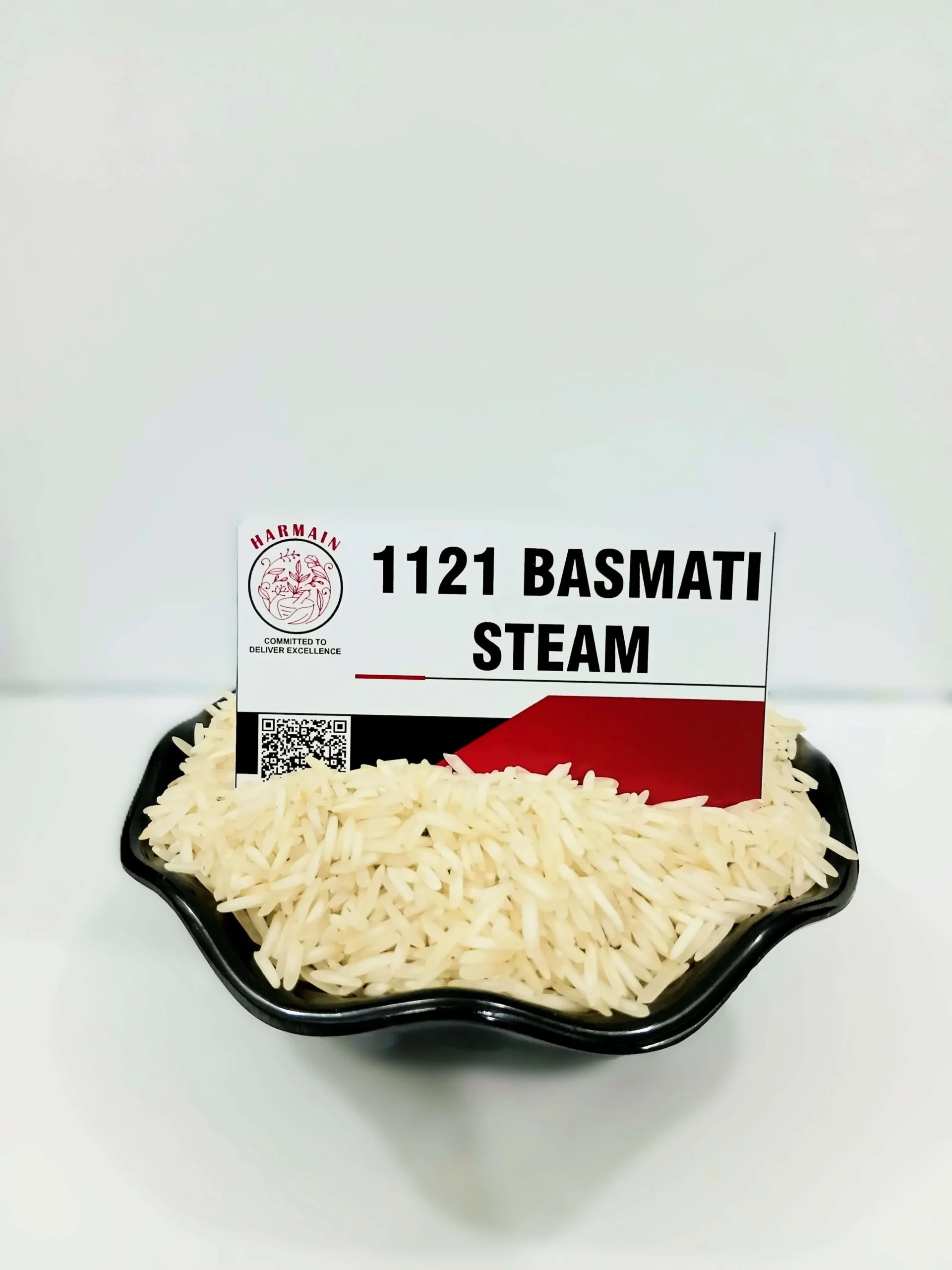 1121 Basmati Steam Rice - Extra long grain premium Pakistani basmati rice in bowl"
